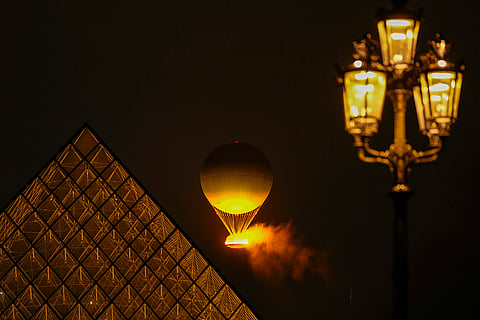Olympic Flame rises on a balloon during the opening ceremony